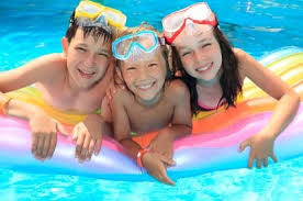 children having fun in the pool