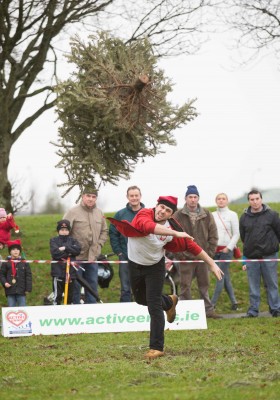 Martin Piotrowski taking part in  the Christmas Tree Throwing Championships at Tim Smyth Park, Ennis on Sunday. Photograph by Eamon Ward