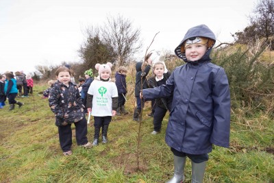 **NO REPRO FEE** Emma Lynch and friends from local primary schools St. Senan’s NS and Gaelsoil Ui Choimin planting their trees as part of the "One Tree per Child" initiative at Active Kilrush Sports Project. Kilrush Tidy Towns, in partnership with local schools and Clare County Council, have embarked on an initiative to ensure every child will plant a tree of their own As part of National Tree Week. Photograph by Eamon Ward